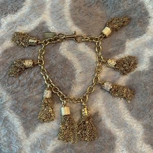 Coach gold and crystal tassel charm bracelet